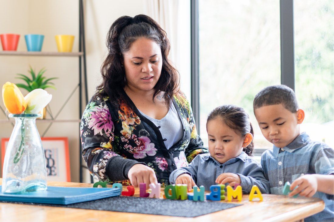 A Woman and Two Children Are Playing — MoneySmith Group In Kingscliff, NSW