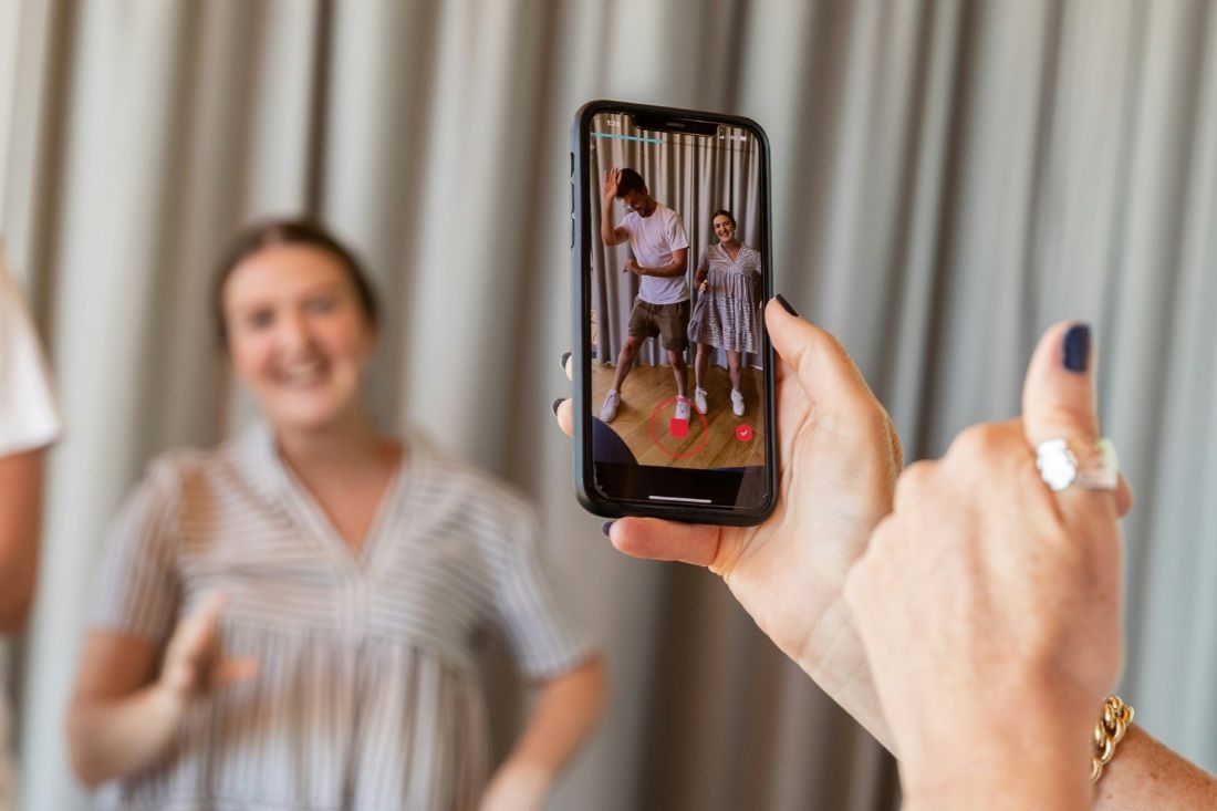 A Person is Taking a Picture — MoneySmith Group In Kingscliff, NSW
