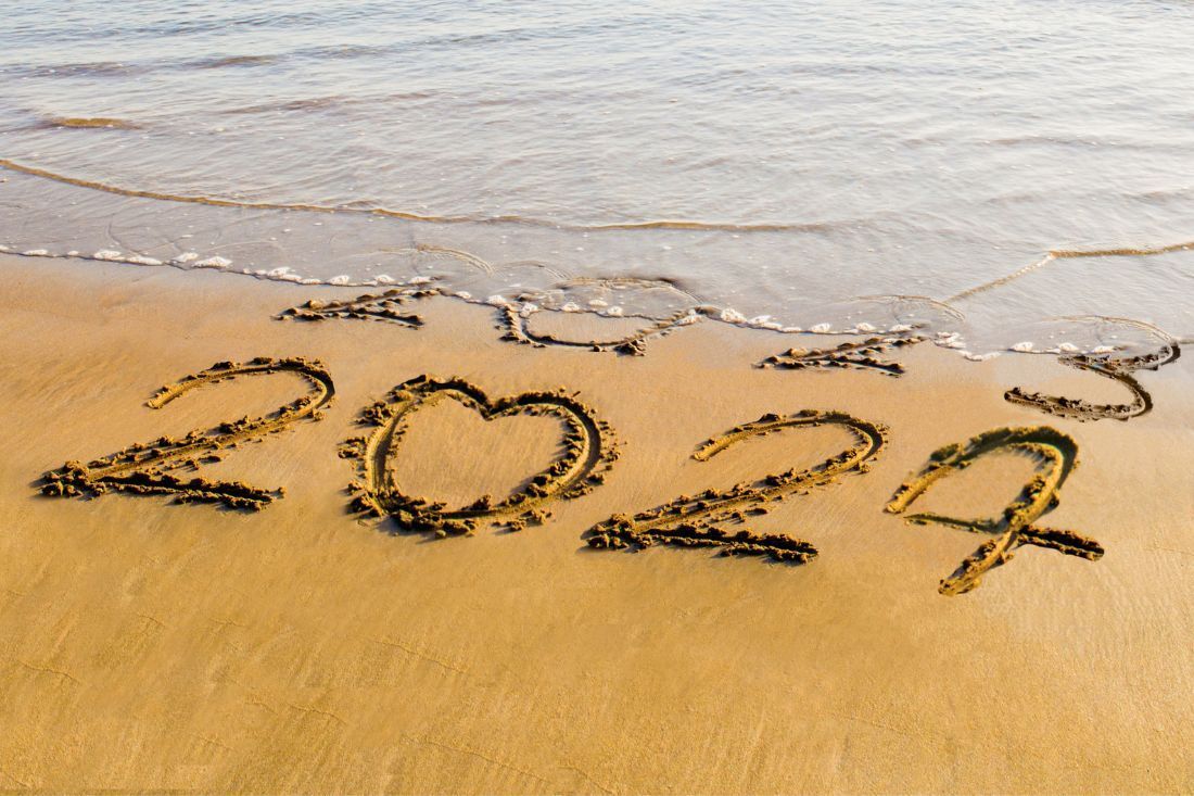 The Year 2022 is Written in the Sand on the Beach — MoneySmith Group In Kingscliff, NSW
