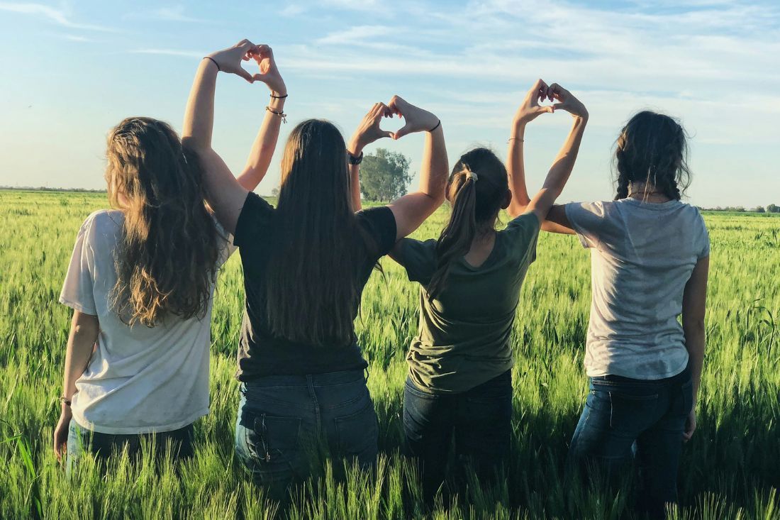 Four Women Are Making a Heart Shape — MoneySmith Group In Kingscliff, NSW