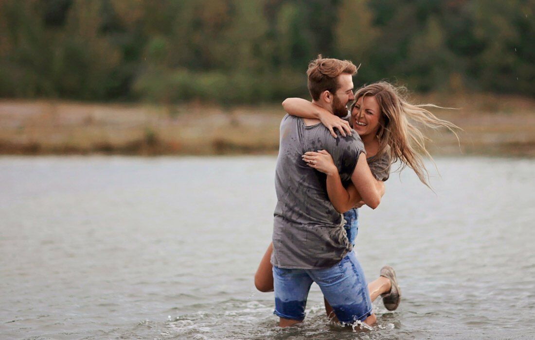 A Man is Holding a Woman in His Arms  — MoneySmith Group In Kingscliff, NSW