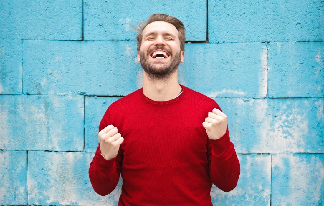 A Man in a Red Sweater Air — MoneySmith Group In Kingscliff, NSW