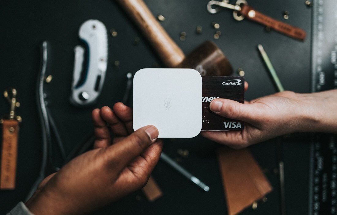 Person is Holding a Visa Card in Their Hand — MoneySmith Group In Kingscliff, NSW