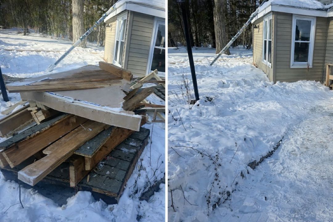 Collapsed porch debris in snowy yard beside a small house
