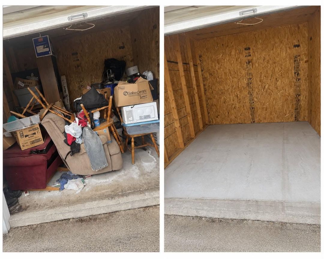 Cluttered storage nook beside an empty wooden shed interior with a gray mattress-like pad on the floor