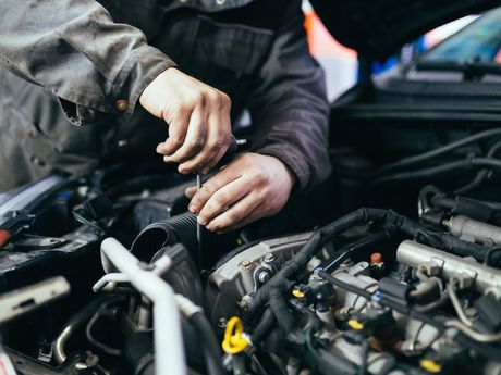 Mechanic working on engine