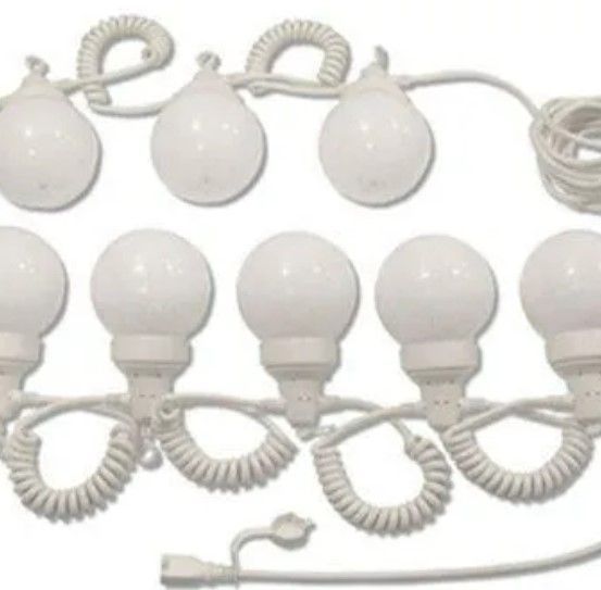 A string of white light bulbs with coiled wires