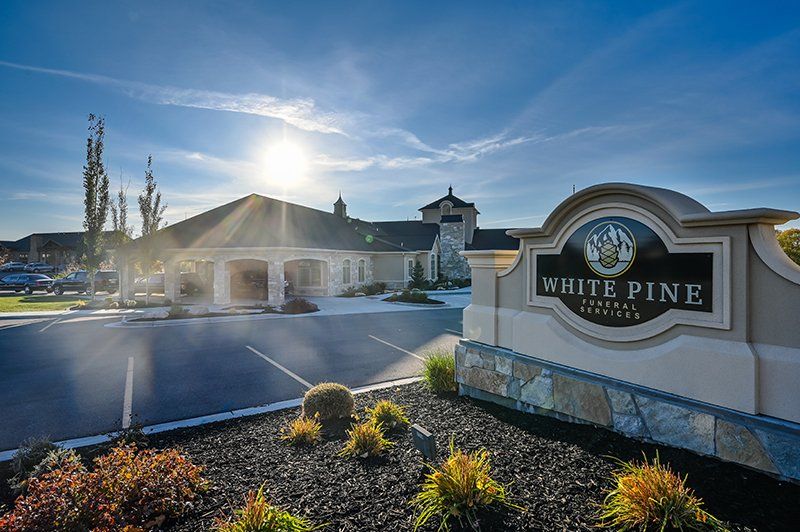 White Pine Funeral Services building and monument sign in Logan, UT