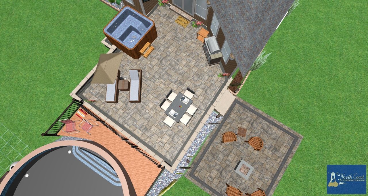 An aerial view of a house with a patio and a hot tub.