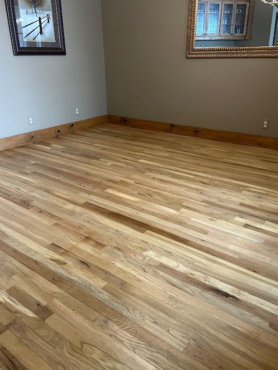 Residential hardwood floor after sandless refinishing service.