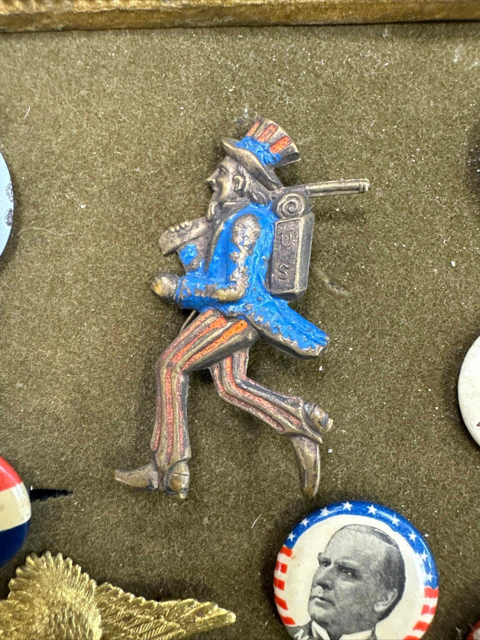 Small blue-uniformed hiker figurine with backpack, walking on a gold background.