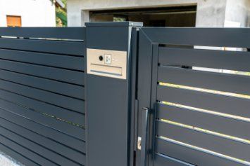 Modern styled house with a driveway, automatic sliding gates in Wollongong NSW.