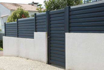 Black-coated colorbond gates in Wollongong NSW, installed in a residential property for added beauty and secuirty.
