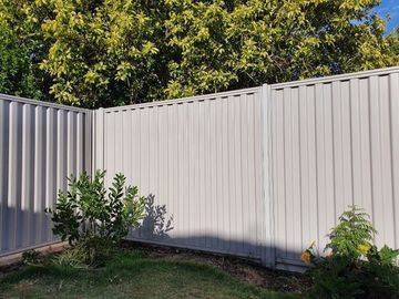 Newly installed colorbond fence for a residential backyard. Photo taken in Wollongong NSW.