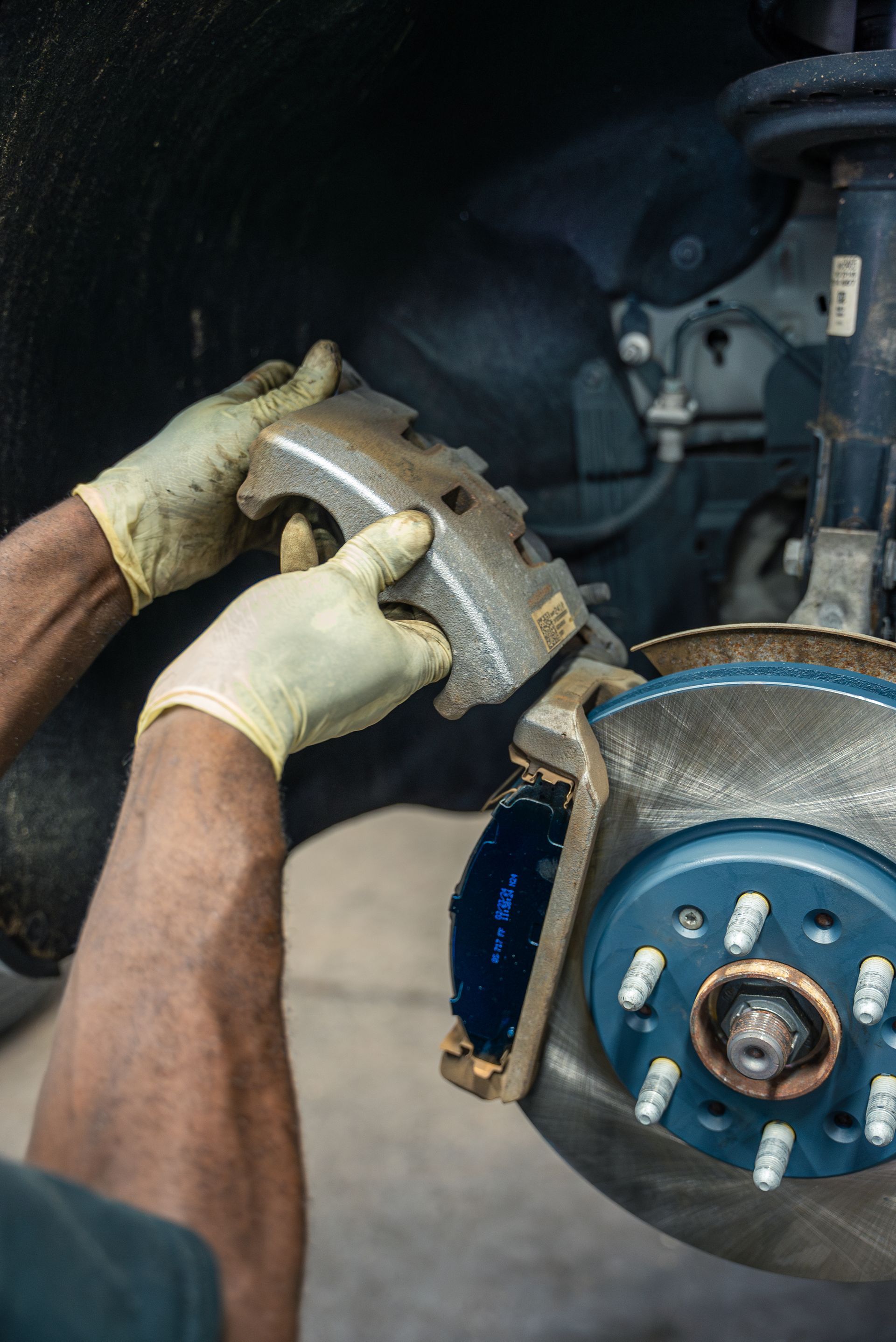 Employee Working - Hands, Brakes | Legend Motors