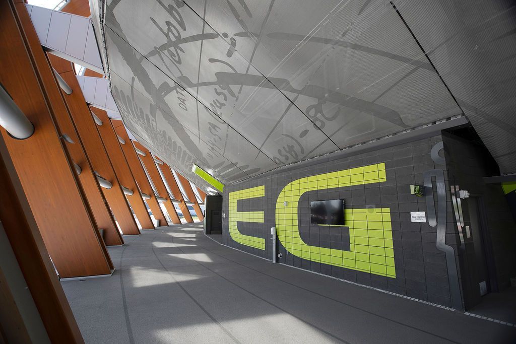 Interior view of a modern building corridor. The word