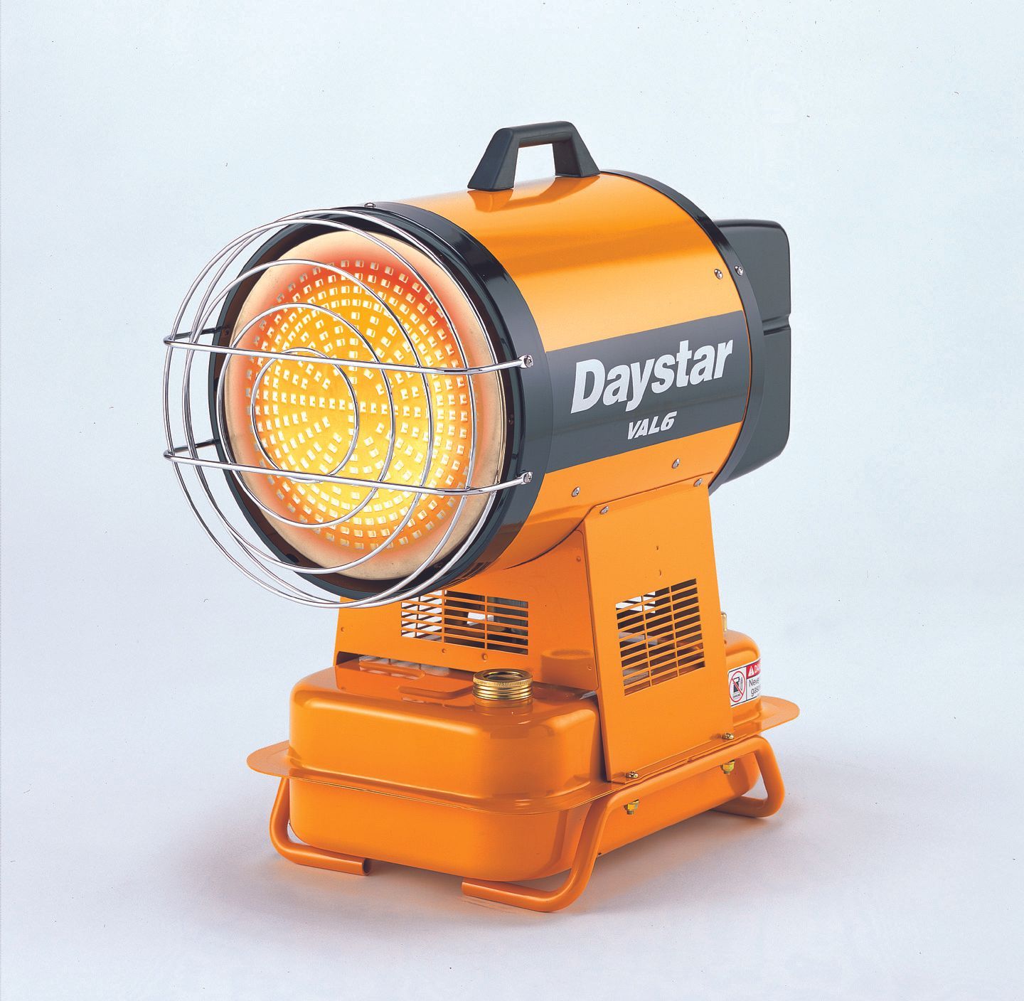 Orange Daystar space heater with safety cage, handle, and fuel tank.