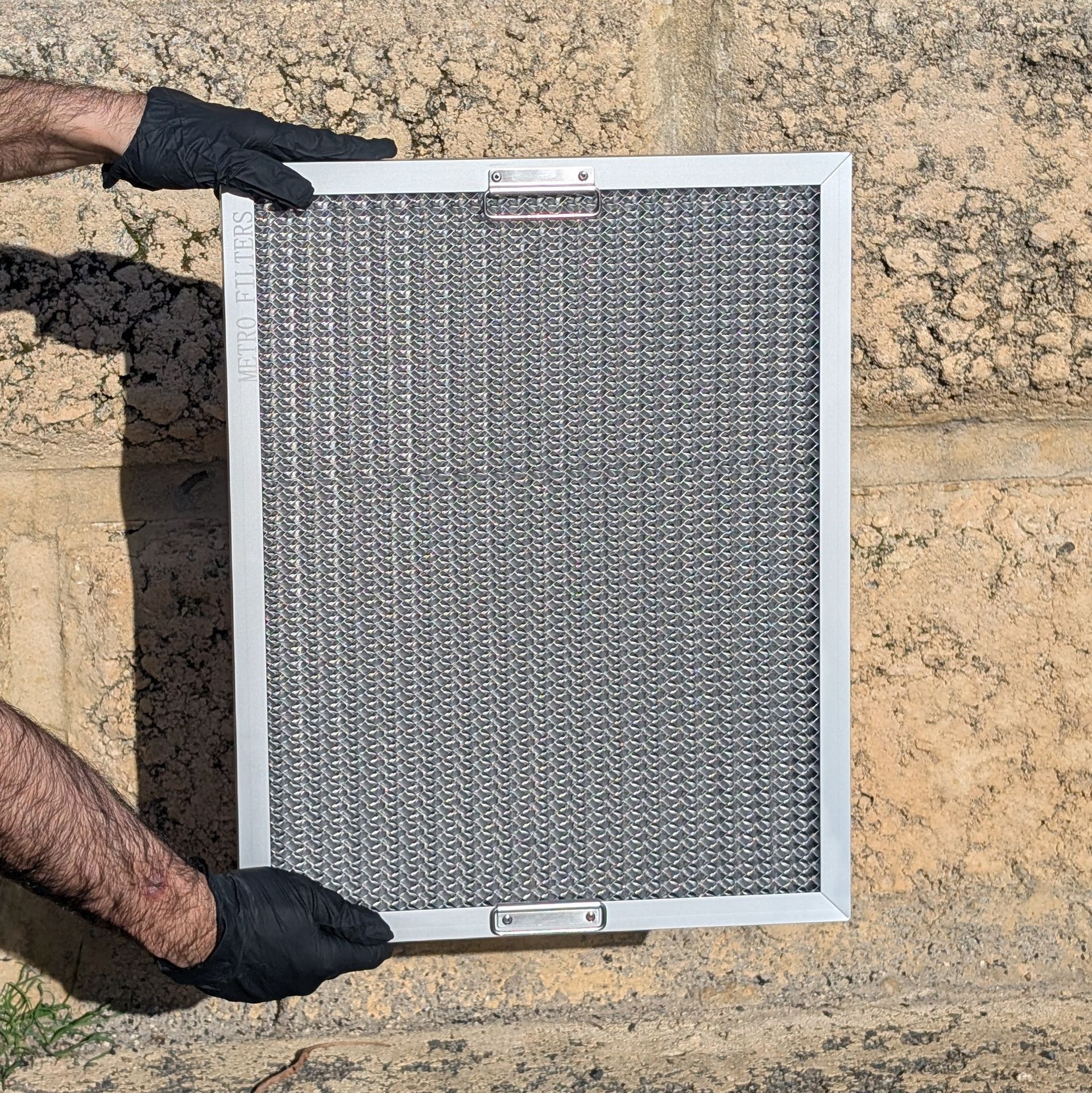 After cleaning commercial kitchen exhaust hood filter