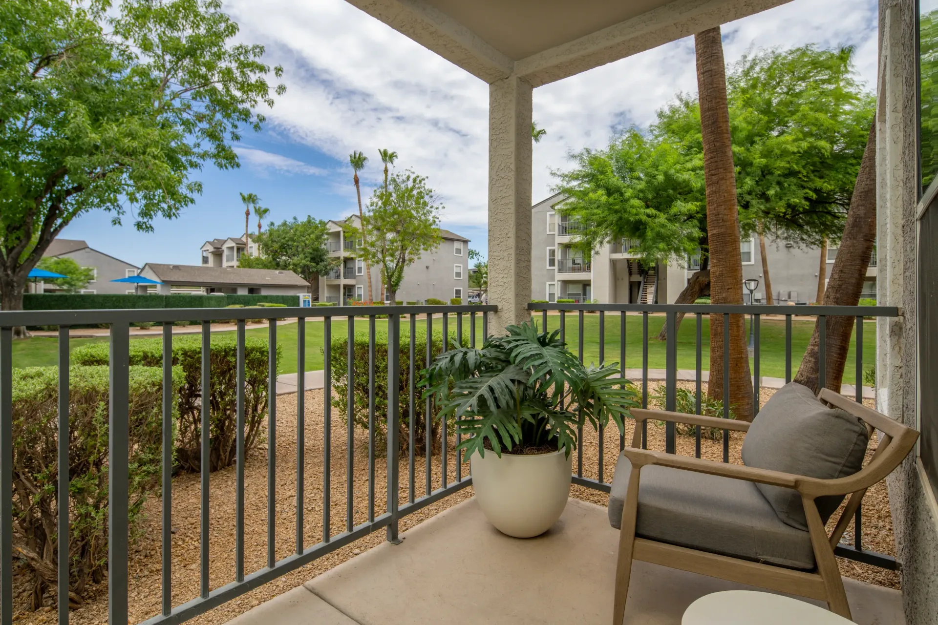 Balcony view of community grounds  at Heritage at Deer Valley in Phoenix, AZ.