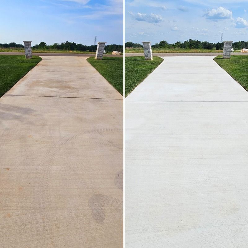 Before-and-after view of a concrete driveway, showing stained tan pavement beside freshly cleaned white pavement.