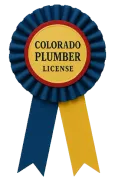 Blue and gold rosette badge labeled “Colorado Plumber License”