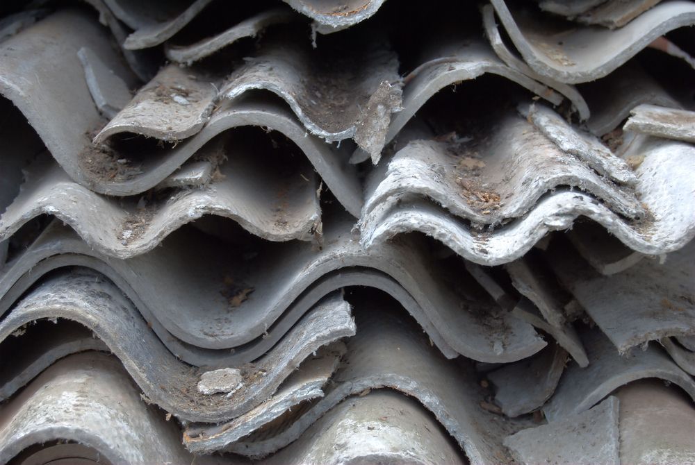 A Pile of Roof Tiles Are Stacked on Top of Each Other — Ballina Demolitions In East Wardell, NSW