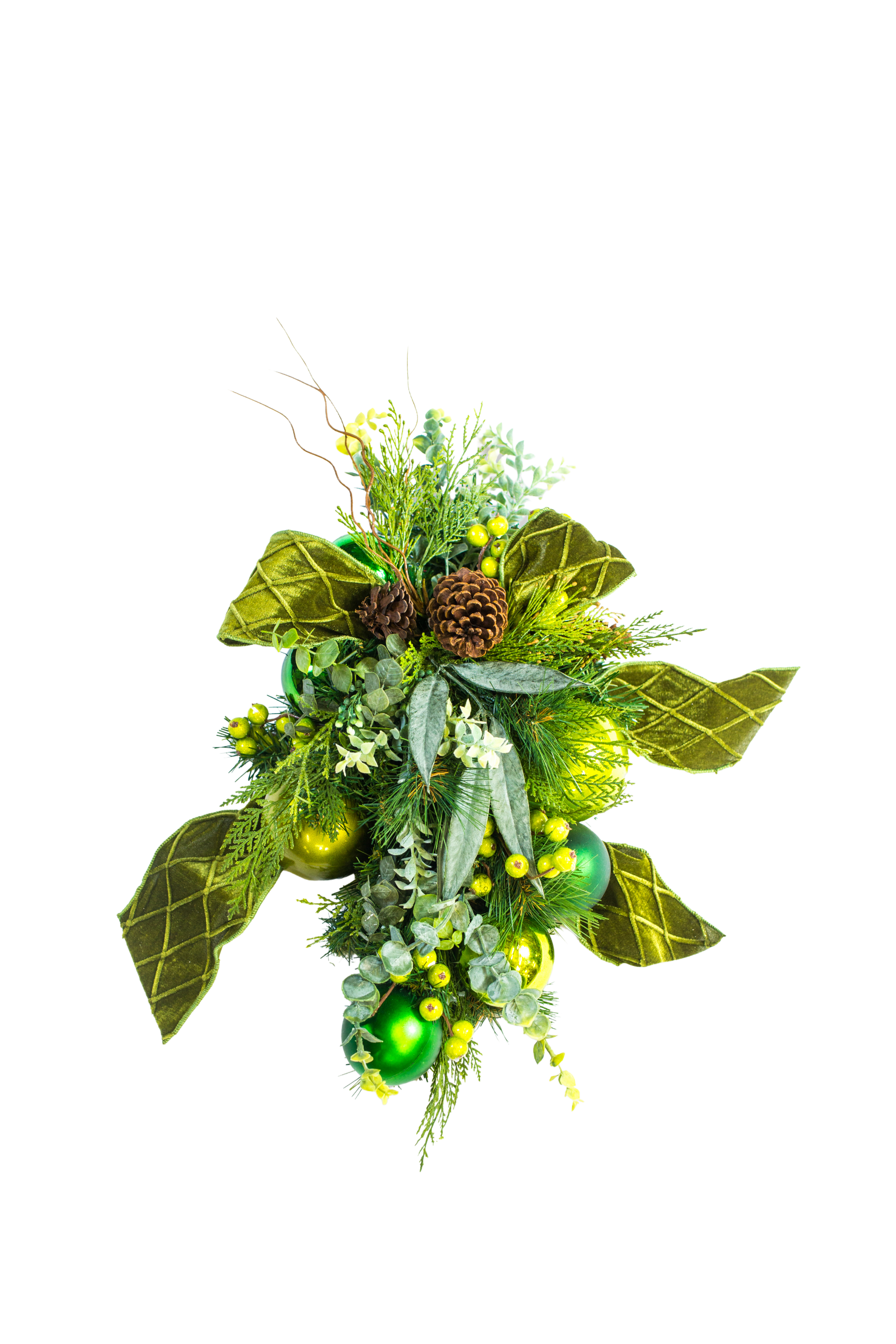 Green and gold Christmas swag with ornaments, bow, and pinecones.