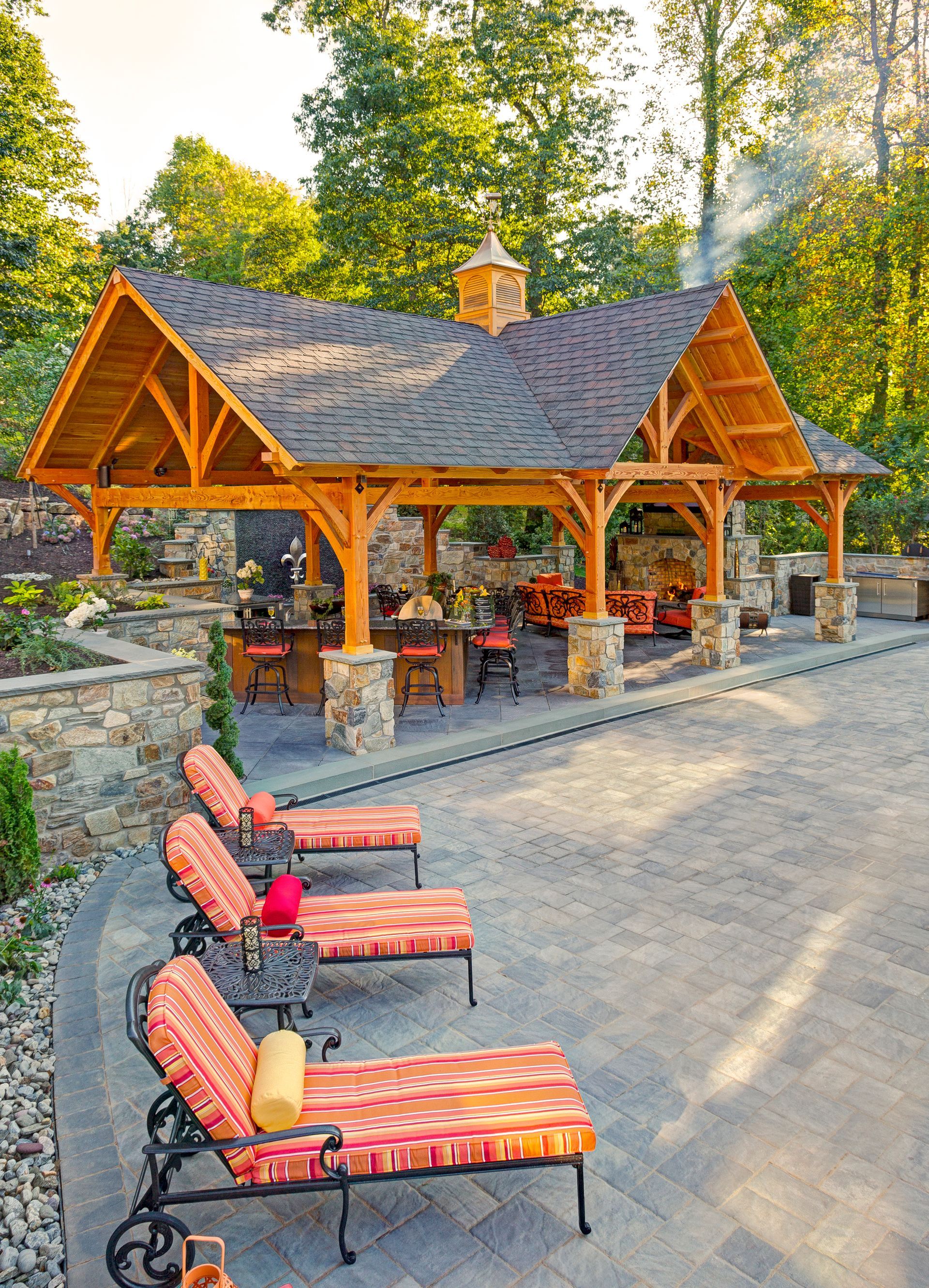 There are a lot of chairs and a gazebo in the background.