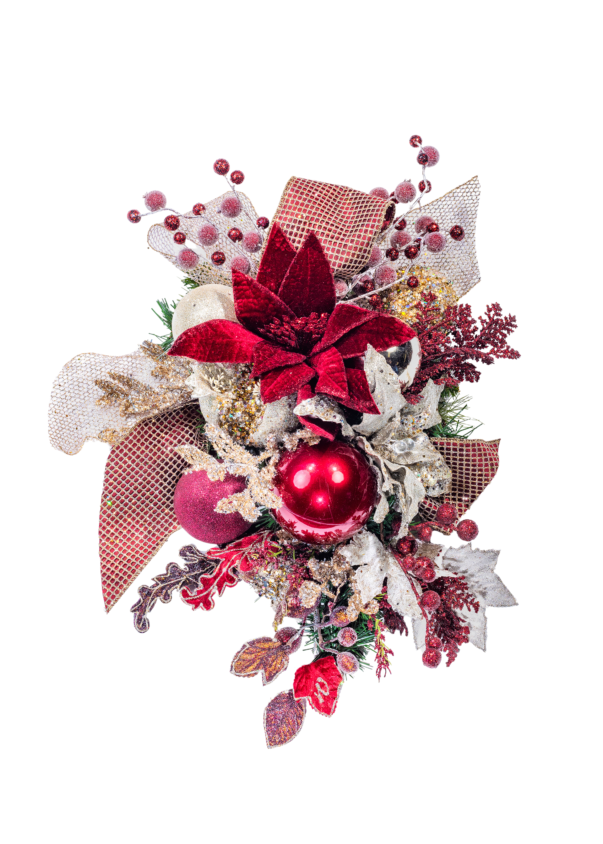 Christmas ornament arrangement: red poinsettia, ornaments, ribbons, and glittery foliage on white.