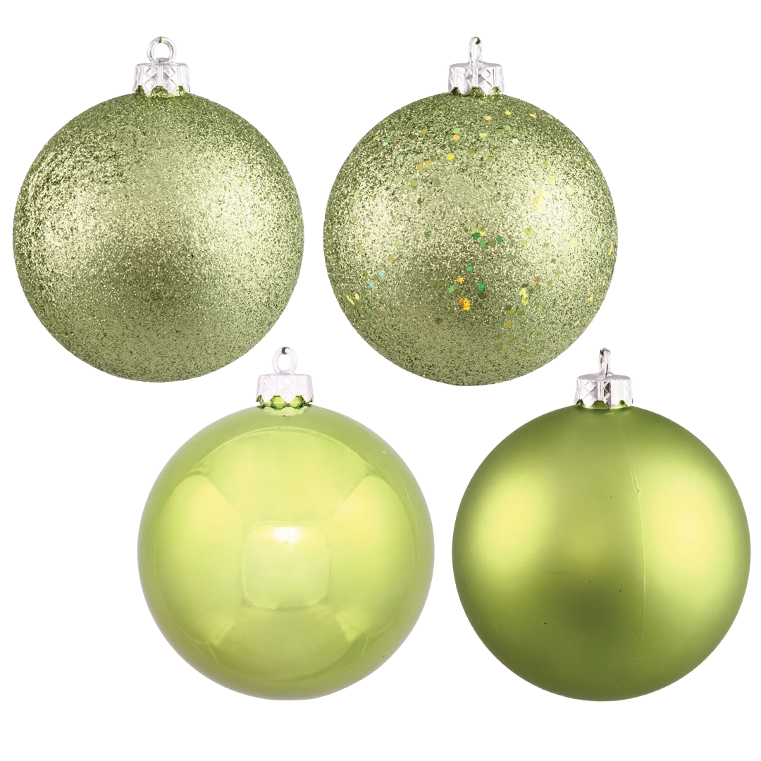 Four green Christmas ornaments: glitter, shiny, and matte finishes.