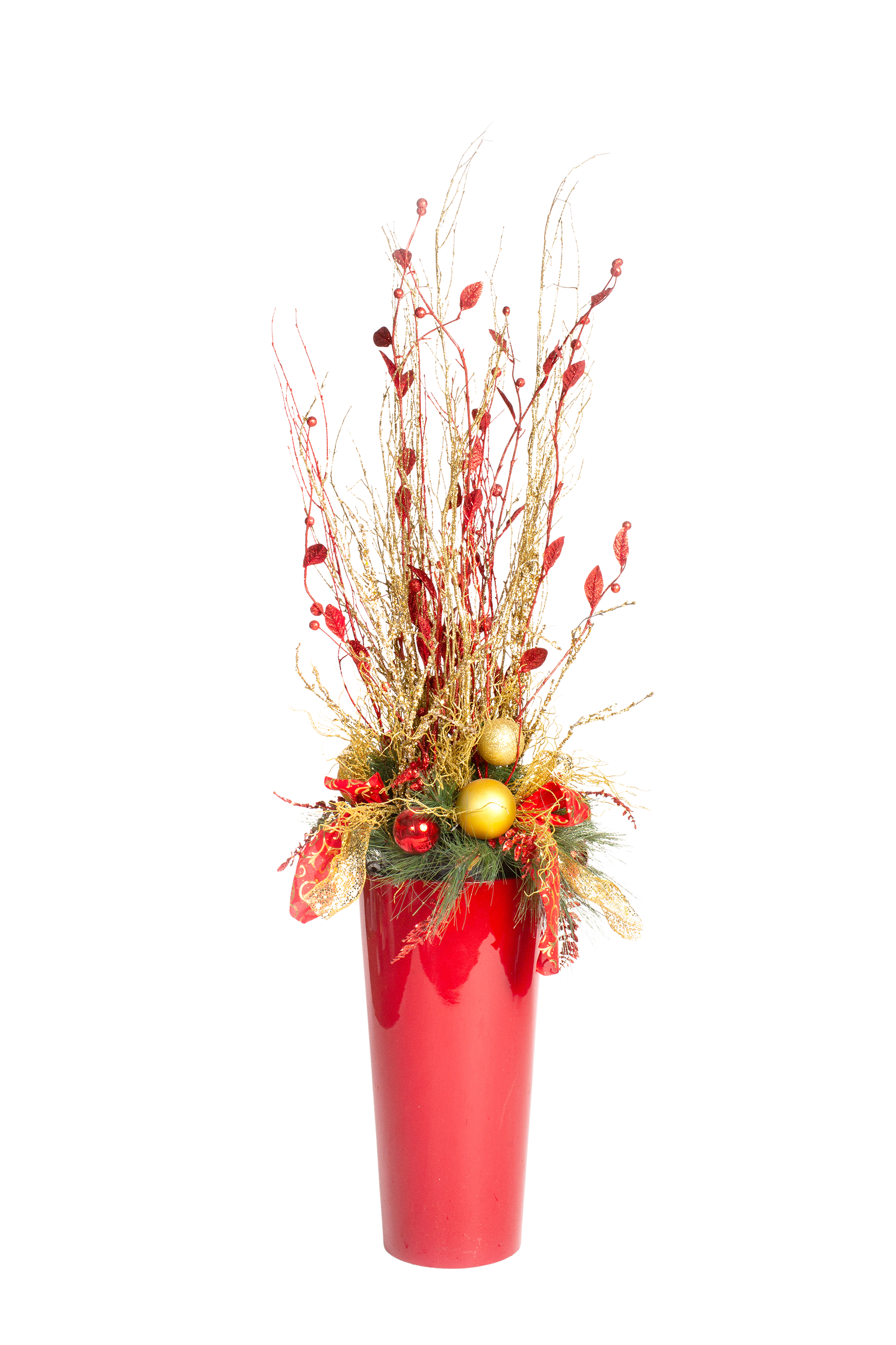 Red vase with Christmas arrangement of red, gold, and green ornaments and branches.