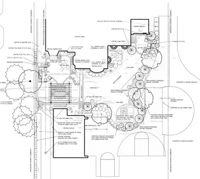 A black and white drawing of a house and a garden.