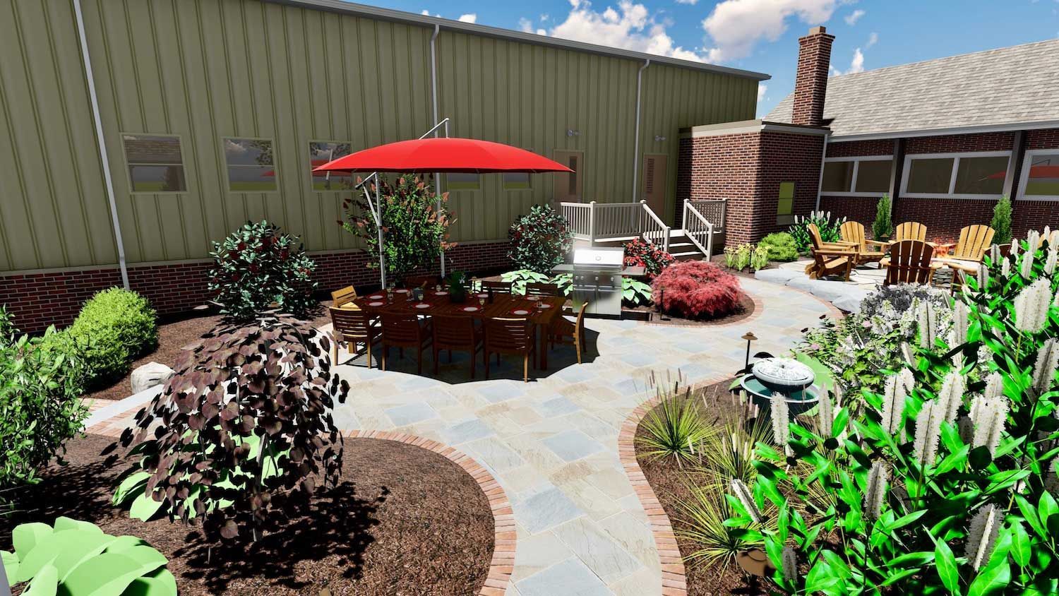 A patio with a red umbrella and chairs in front of a house.