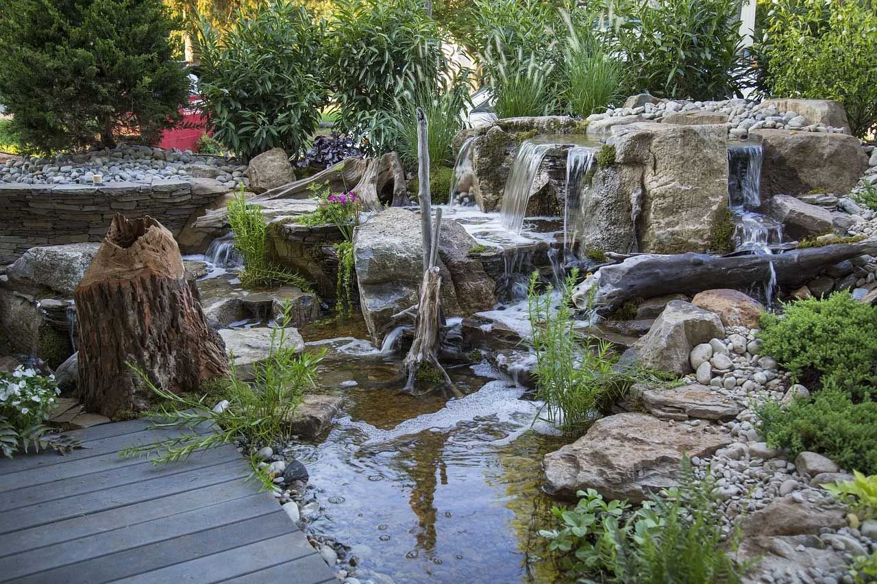 There is a waterfall in the middle of the garden.