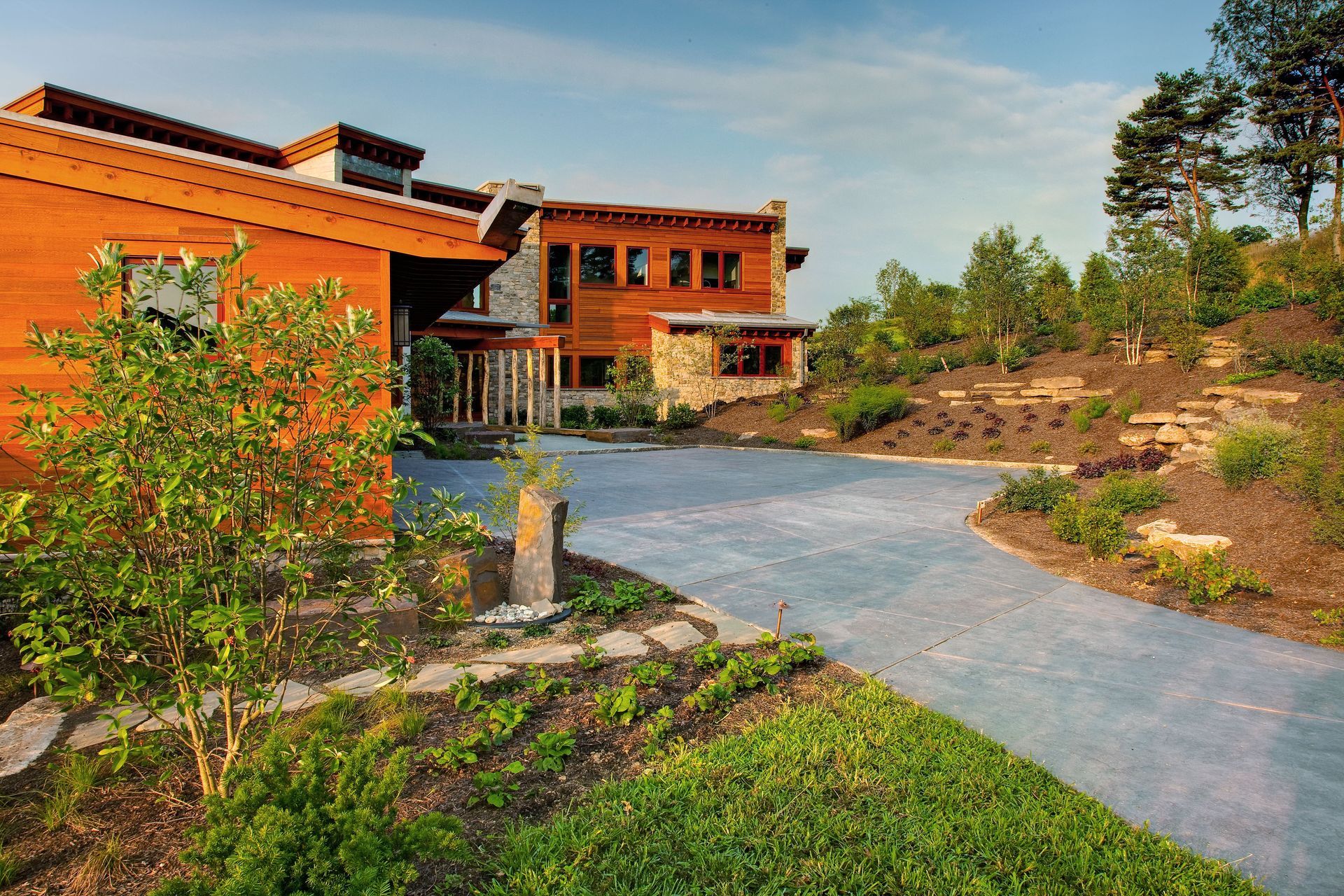 A large house with a driveway leading to it