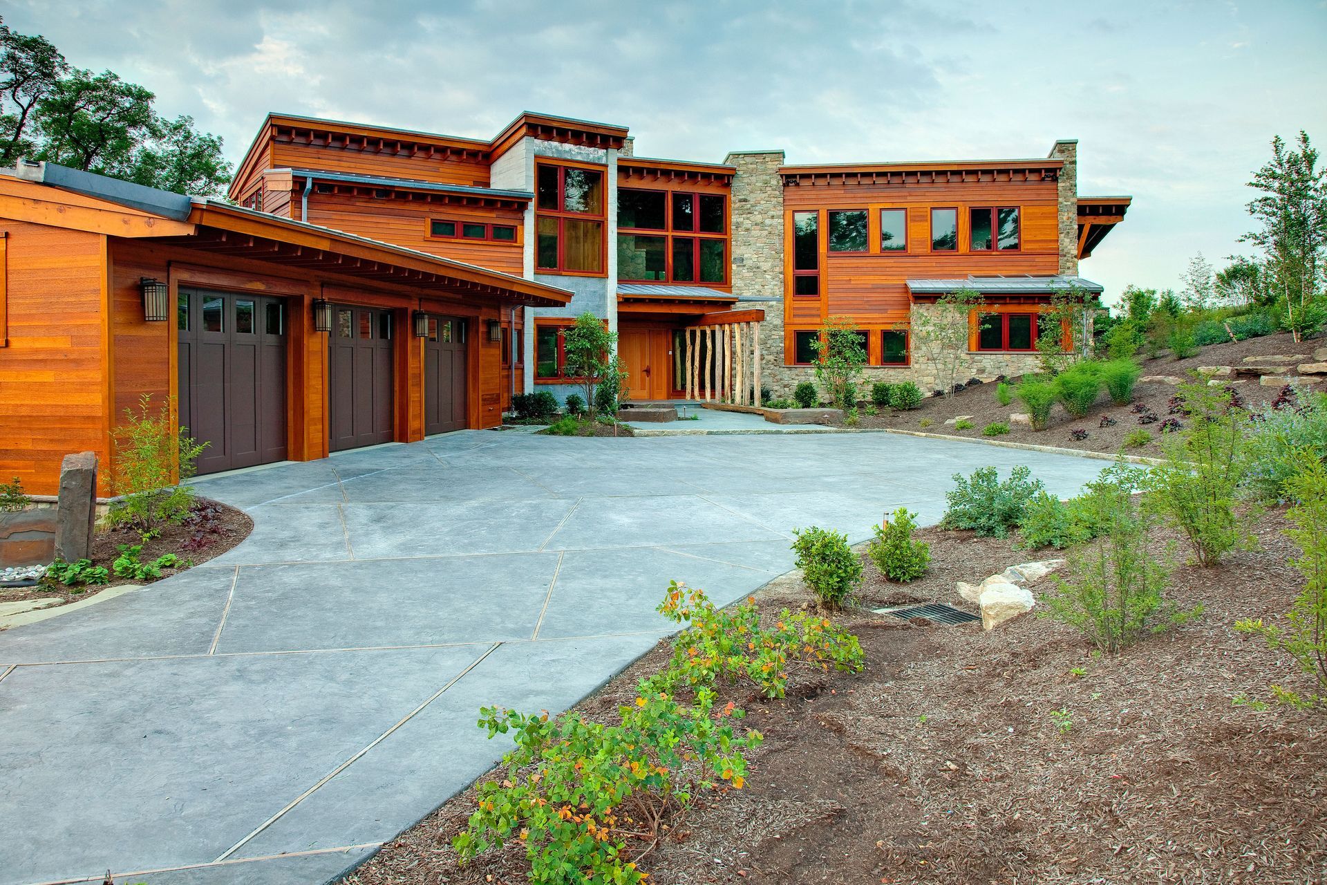 A large house with a driveway leading to it