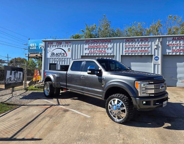 Black Pickup Truck Parked Outside Auto Repair Shop | Black’s Automotive & Diesel