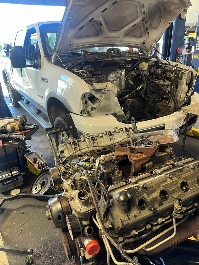 Truck Engine Undergoing Major Repair Work Inside Garage | Black’s Automotive & Diesel