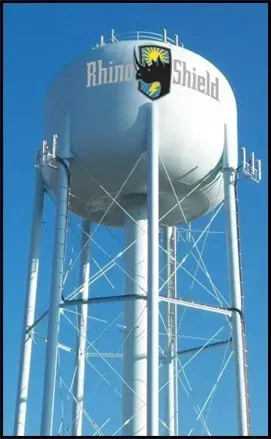 White Rhino Shield water tower against a clear blue sky