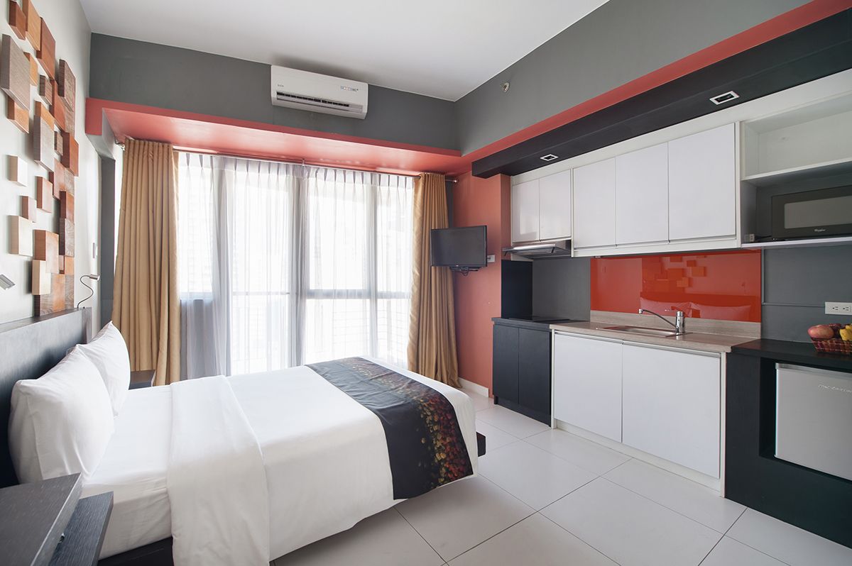 Modern studio room with kitchenette at KL Serviced Residences Makati