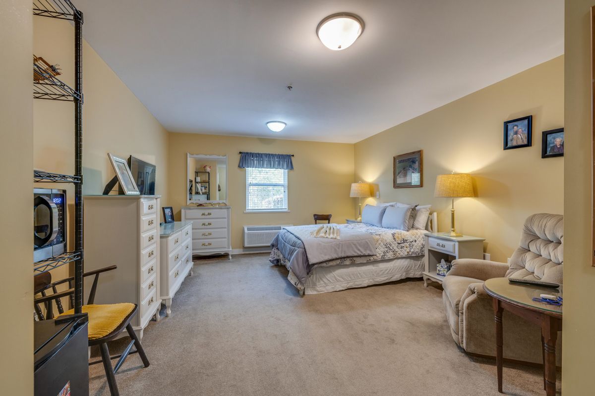 There is a large bed in the middle of the room.
