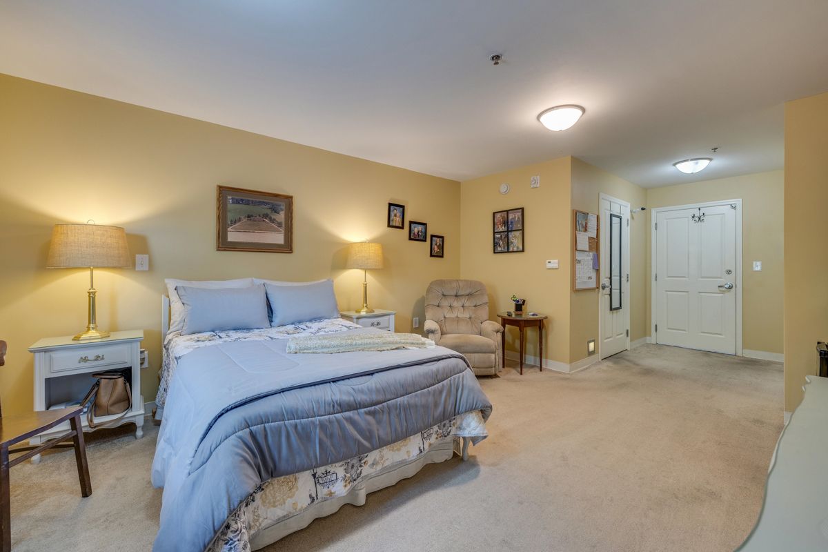 There is a large bed in the middle of the room.