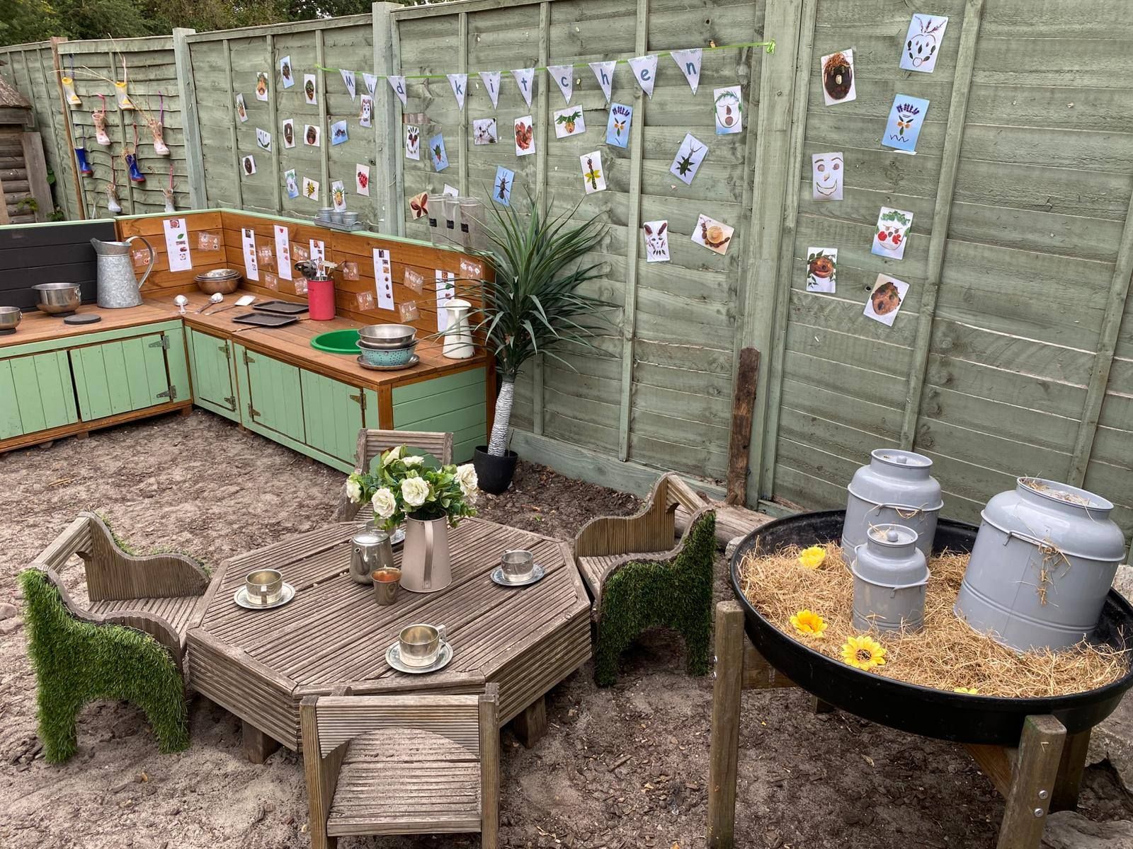 Outdoor mud kitchen nursery activities