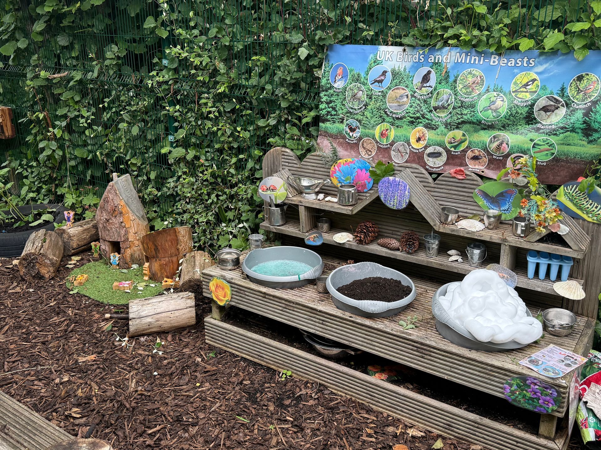 The mud kitchen in our toddler garden at our Berkhamsted nursery.