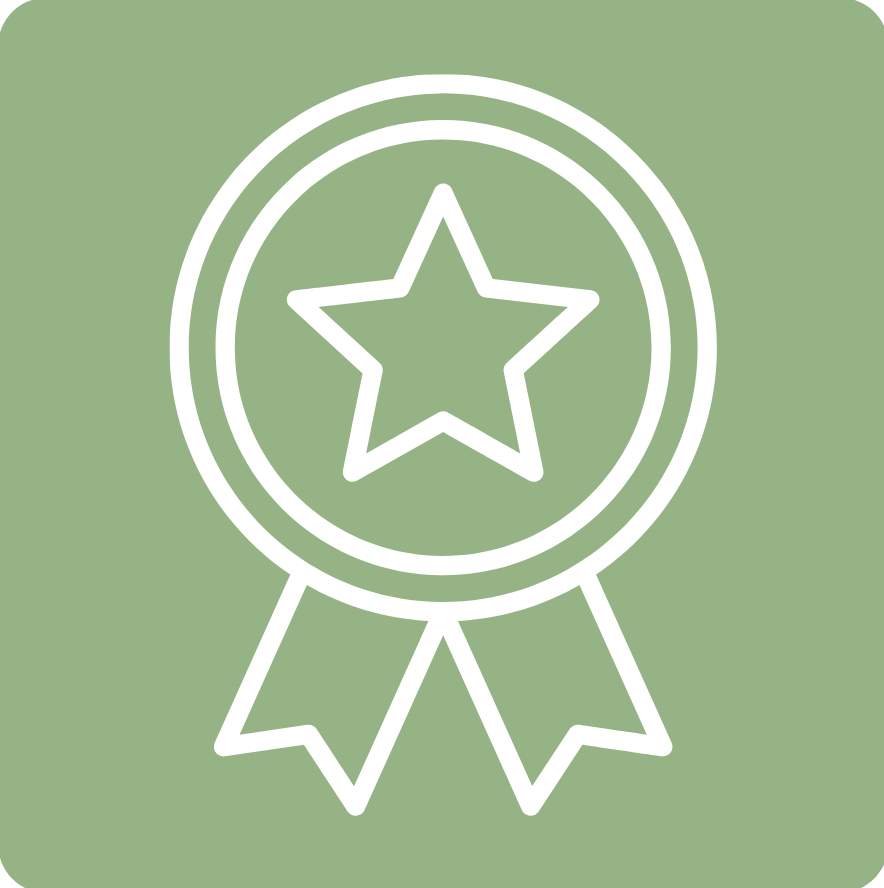 A white ribbon with a star in the middle on a green background.