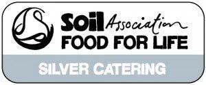 The logo for the soil association food for life silver catering.