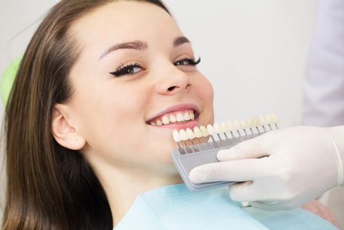 Woman Is Sitting In A Dental Chair — Dentist On Tweed in Tweed Heads, NSW