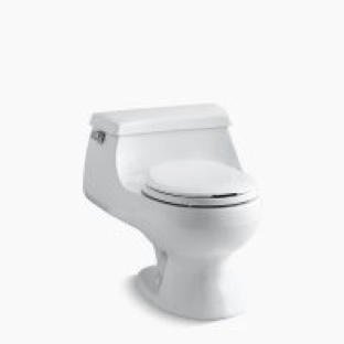 A white toilet is sitting on a white surface.