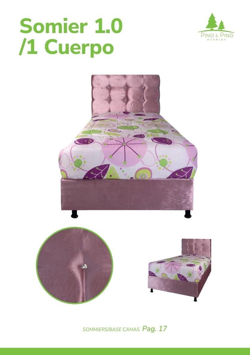 Una cama individual tapizada en color morado con cabecero capitoné