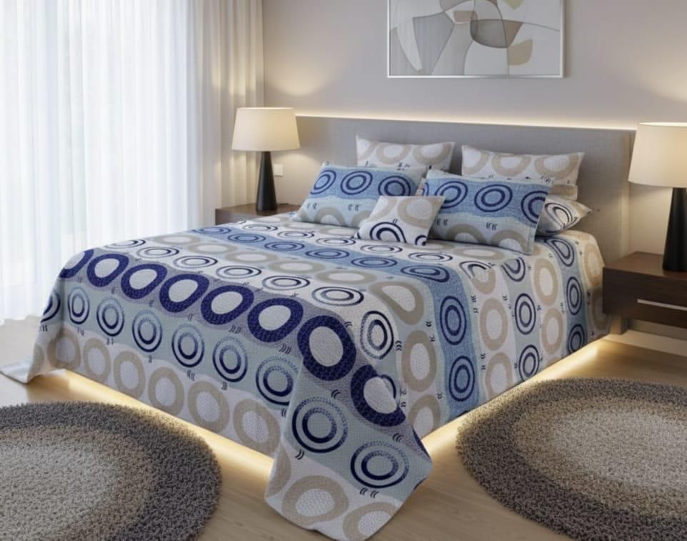 Un dormitorio moderno con una cama con una colcha de estampado circular